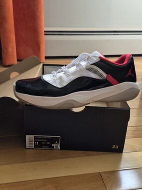 Air Jordan 11 CMFT Low Sneaker in Black, White & Red